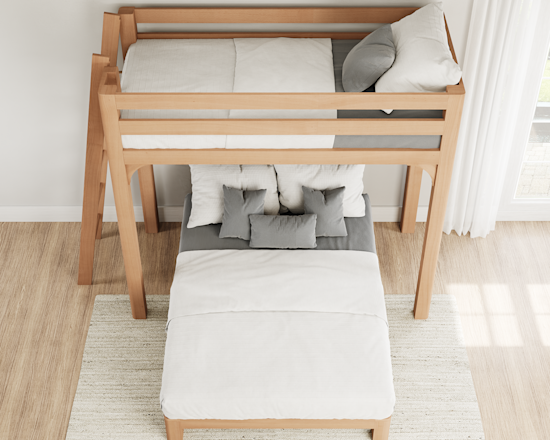 Wooden bunk bed with a double mattress on the bottom and a single mattress on top. The bed is neatly made with white and gray bedding. Four small pillows are arranged on the bottom bed. Light wood flooring and white curtains in the background.