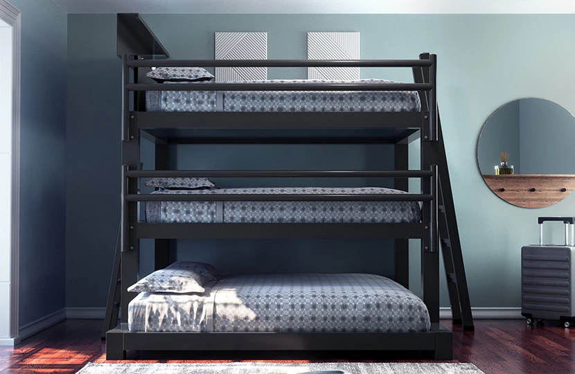 Charcoal Triple Bunk Bed for Adults in a neutral, sparsely decorated guest bedroom seen directly from the right-hand side of the bed with the guardrails.