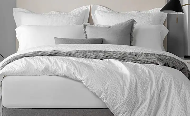 A graphite colored Circa Bed Wrap on a queen size platform bed