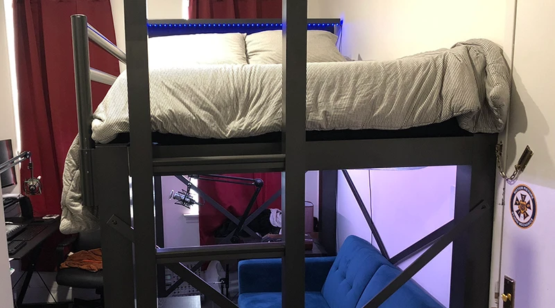 A black Full Loft Bed in a New York City apartment