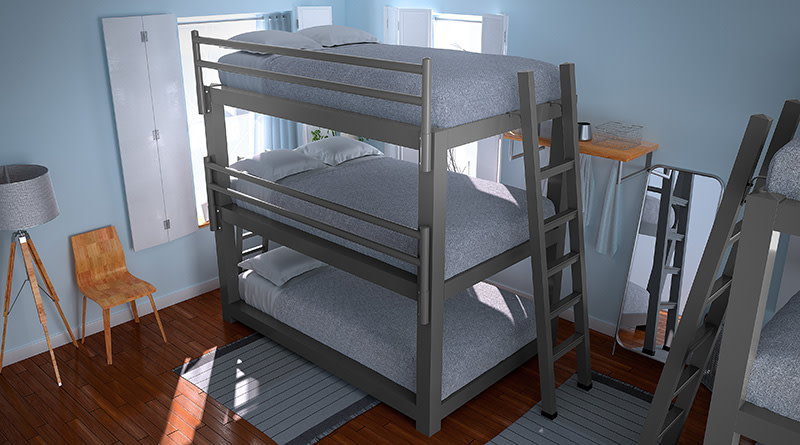 A charcoal Full XL Triple Bunk Bed in a hostel seen from above.