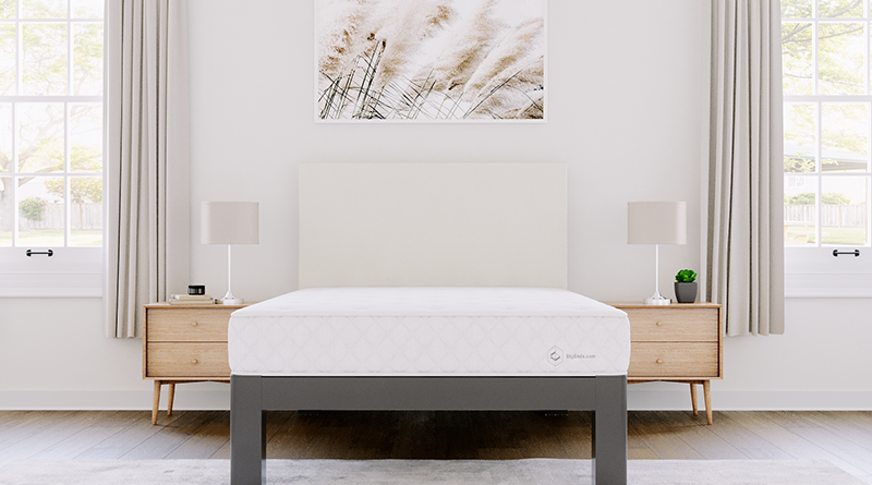 Extra long Full size version of the BigBeds.com Luxe Slumber Hybrid mattress on a charcoal Full XL Platform Bed with an Ivory headboard seen directly from the foot of the bed.