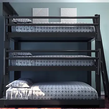 A charcoal Queen Over Queen Over King size Adult Triple Bunk Bed in a nice, sparsely decorated guest bedroom. Seen directly from the right-hand side of the bed.
