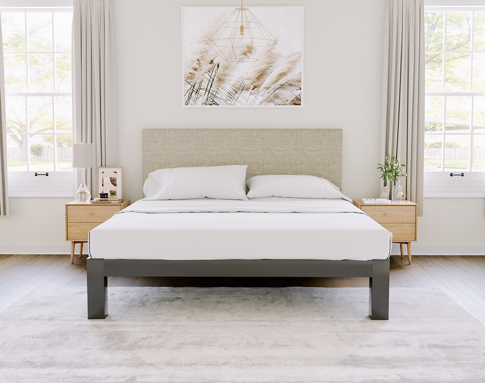 Charcoal Texas King size metal Platform Bed with an Oatmeal fabric headboard seen in an upscale master bedroom with light and neutral decor seen head on from the foot of the bed.