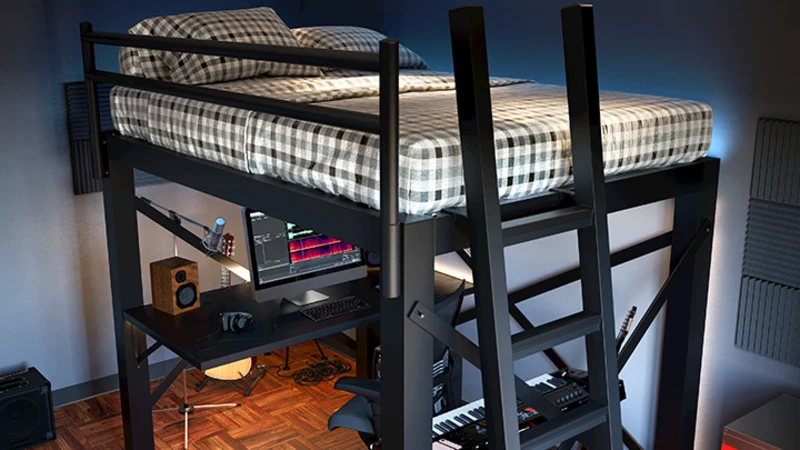 A black loft bed with checkered bedding sits above a music workstation. Below, there's a computer monitor, keyboard, and audio equipment. A ladder provides access to the bed. The room has dark walls and wooden flooring.