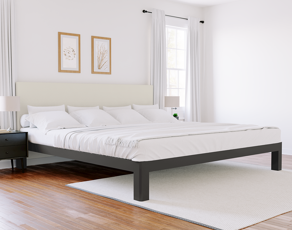 A charcoal Alaskan King size metal Platform Bed with an Ivory headboard in an upscale, neutrally designed bedroom with white walls.