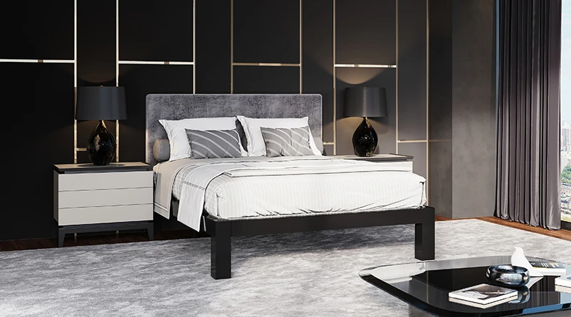 A black queen size metal Platform Bed with a gray headboard in a beautiful high rise apartment bedroom in a major metropolitan city with high-end furnishings. Seen from the lower right-hand corner of the bed frame.