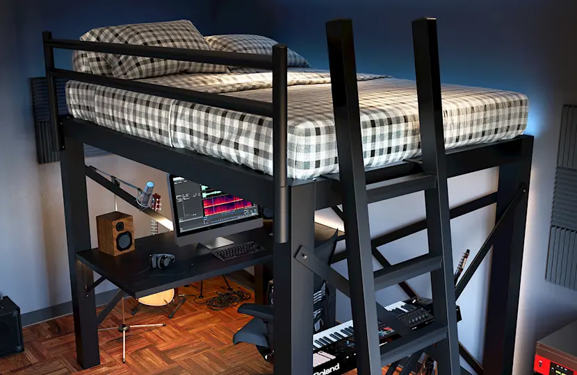 A loft bed with a checkered duvet is above a workspace with a desk, computer monitor, speakers, headphones, and keyboard. Soundproof panels adorn the walls, and a wooden floor completes the cozy setup.