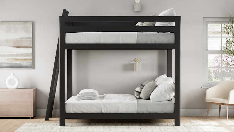 A spacious queen-over-queen bunk bed in a charcoal finish, designed to combine adult-sized comfort, dependable strength, and timeless style while maximizing sleeping space. 