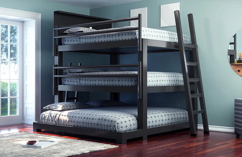 Charcoal Triple Bunk Bed for Adults in a nice, neutral guest bedroom space seen from the lower right-hand corner of the bed with the guardrails.