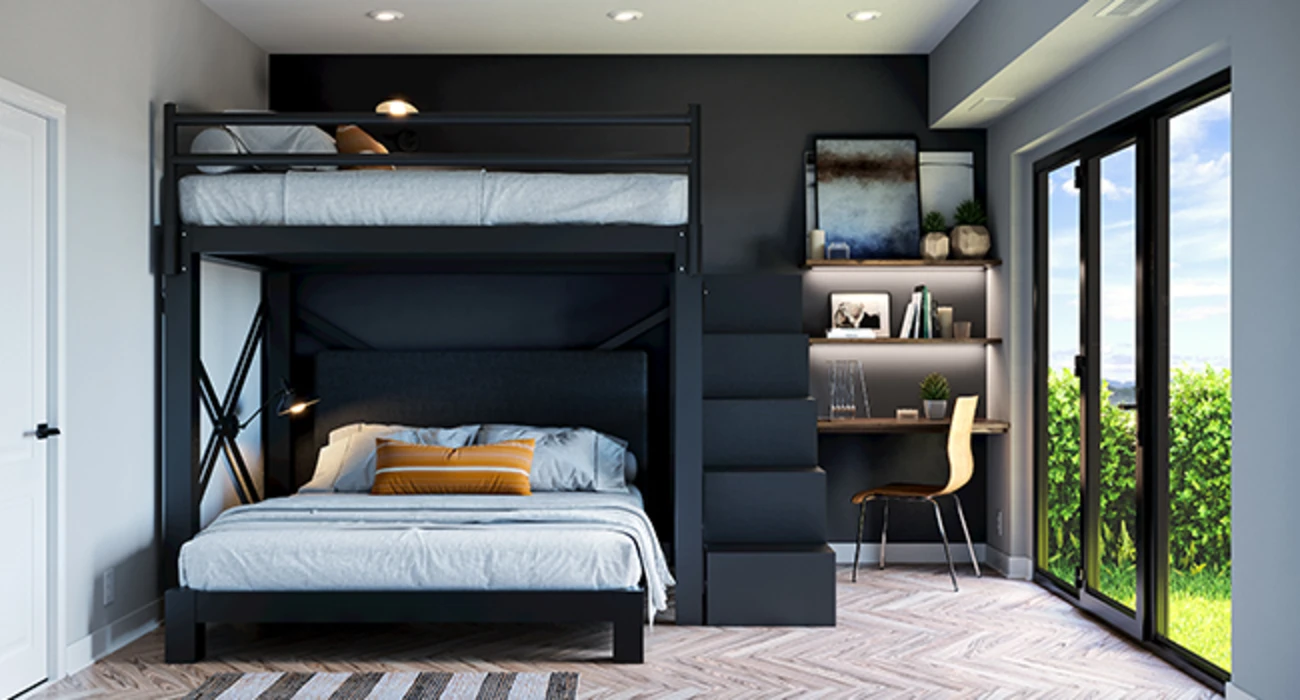 Black Full Over Queen size metal L-Shaped Adult Bunk Bed with a matching wooden staircase in a super nice guest room. Seen directly from the foot of the bottom bunk.