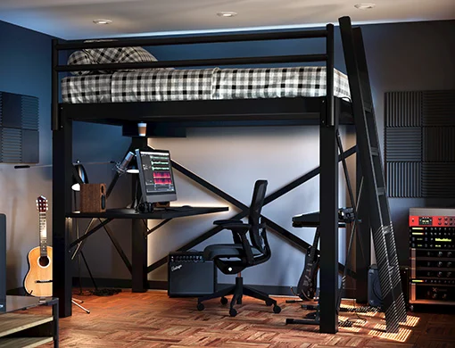 A Black Queen Size Adult Loft Bed with a home recording studio setup beneath the loft bed frame. Seen from a slight angle from the lower right-hand corner.