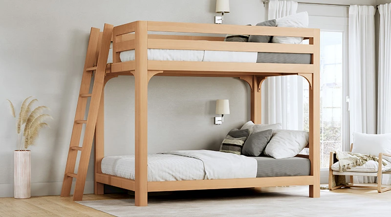Light colored queen over queen Wood Bunk Bed for Adults in a nice, upscale bedroom with a lot of natural light seen from the left-hand side of the bed at a slight angle toward the foot of the bed frame.