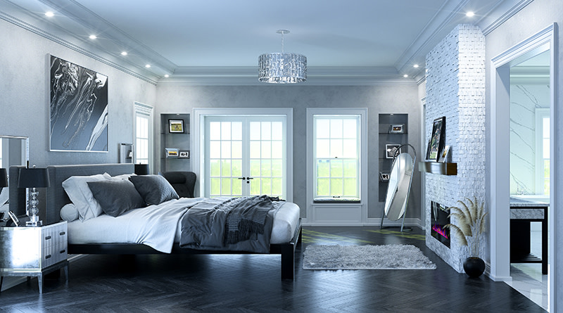 A black Alaskan King Platform Bed frame in an affluent luxury master bedroom with a lot of gray and black tones seen from a distance directly from the side.