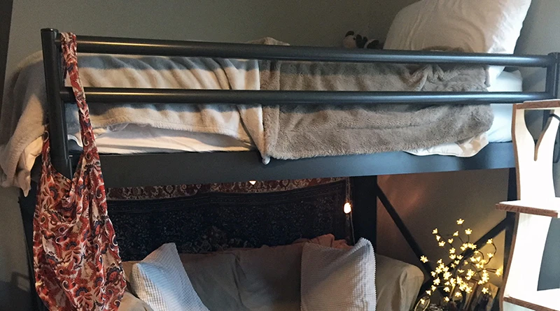 A charcoal Full XL Adult Loft Bed in a bedroom