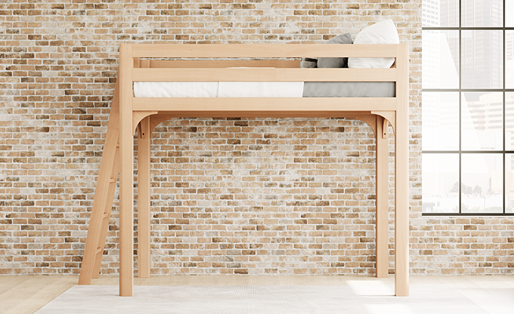 Light colored queen size Wood Loft Bed for Adults in an urban loft-style apartment with exposed brick walls, seen from the left-hand side of the bed at a slight distance.