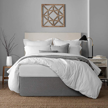 A graphite colored Circa Bed Wrap on a queen size platform bed