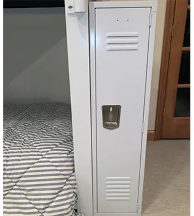 A white individual locker next to a white Twin Over Twin Adult Bunk Bed