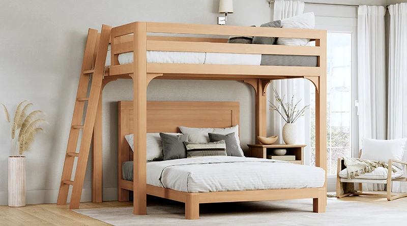 Light Queen Over Queen Wood L-Shaped Bunk Bed for Adults in a nice upscale neutral bedroom with grey and white bedding seen from the lower right-hand corner of the bottom bunk.