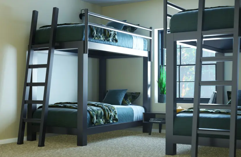 Two Charcoal Adult Bunk Beds in a simple dorm bedroom. Seen from the lower left-hand corner of the bed on the left side of the frame, with the other partially in frame on the right side of the image.