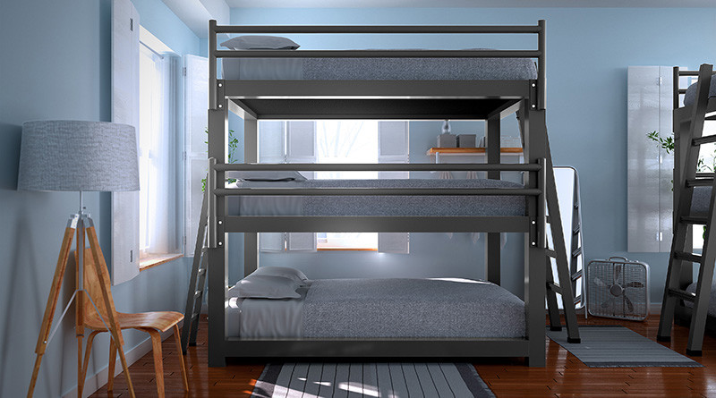 A charcoal Full XL Triple Bunk Bed in a hostel seen from the side.