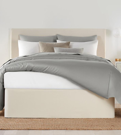 An ivory colored Circa Bed Wrap on a queen size platform bed
