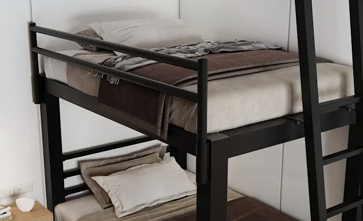 Black Full Over Full Bunk Bed for Adults in a nice guest bedroom seen from the lower right-hand corner of the bed at a high angle so you can see the whole top bunk.