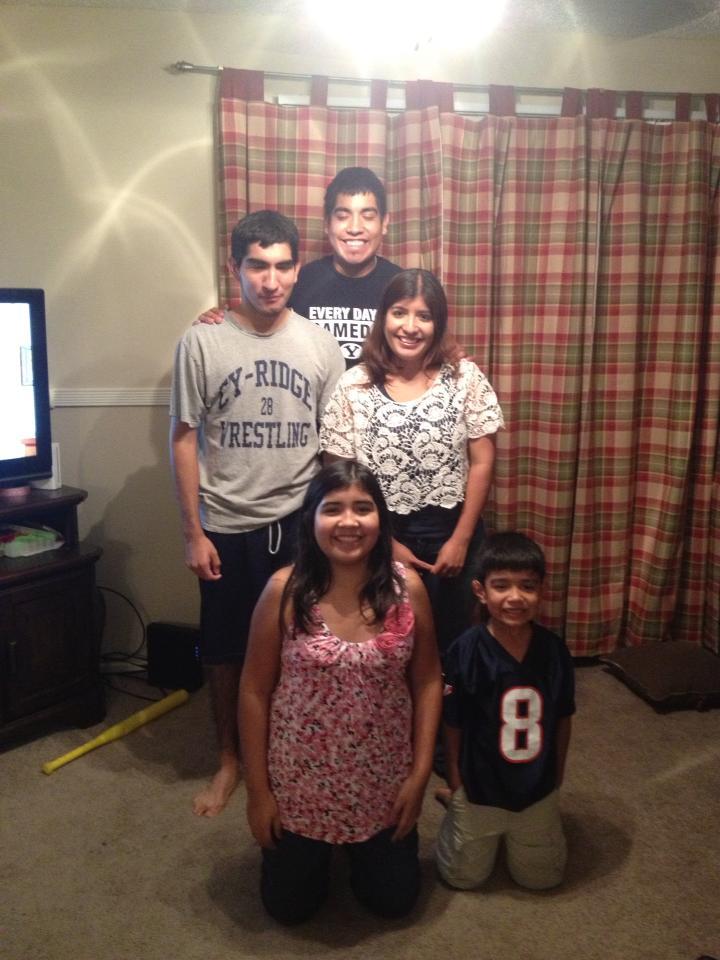 Martinez siblings kneeling