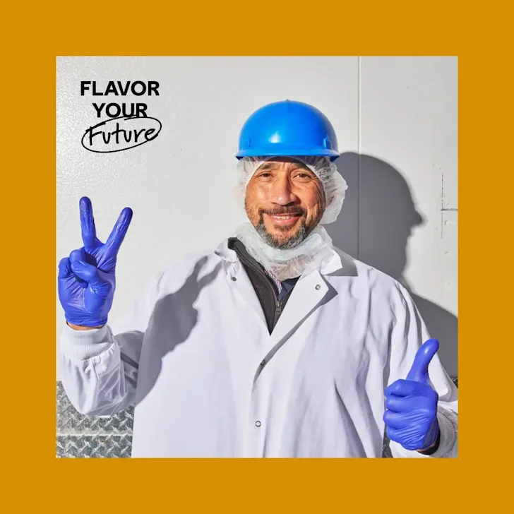 CAVA Team Member James smiling at the camera with black text saying "Flavor Your Future"