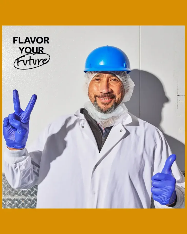 CAVA Team Member James smiling at the camera with black text saying "Flavor Your Future"