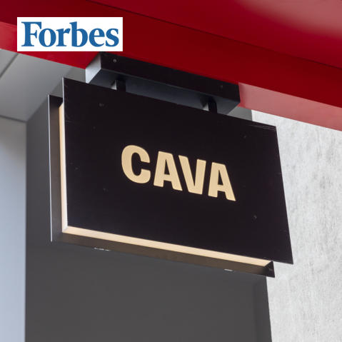 Forbes logo on a photo of a CAVA sign