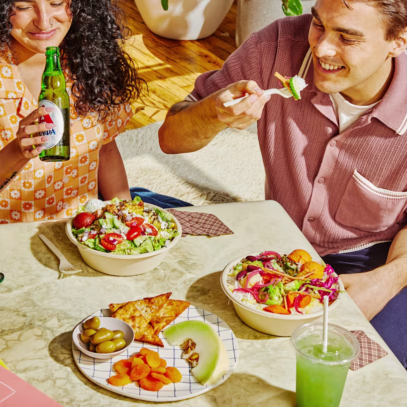 CAVA Customers Enjoying Salad Bowl