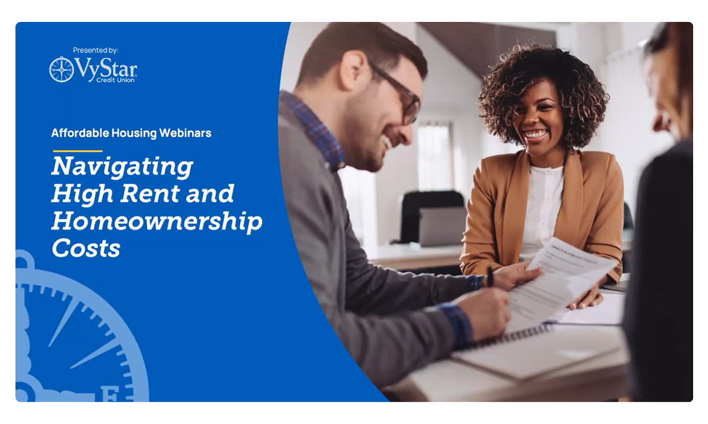 VyStar Credit Union webinar promotion showing two people reviewing documents at a table with text ‘Navigating High Rent and Homeownership Costs.’