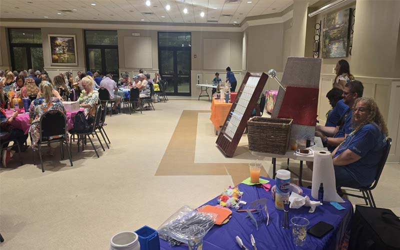 A photo of a group of people attending a bingo night at SAFE animal shelter