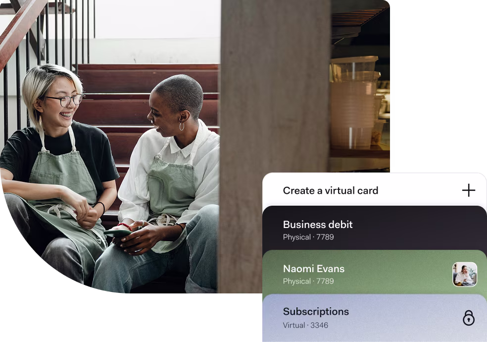 Two small business team members in aprons sit on stairs, chatting during a break. Beside them, a digital wallet interface displays three Found cards labeled “Business debit,” “Naomi Evans,” and “Subscriptions,” highlighting individual and virtual card management features.