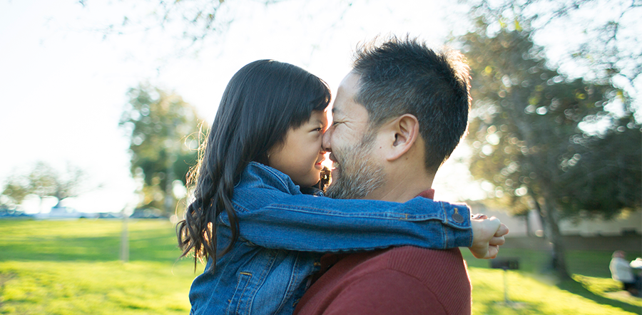 child and man interacting