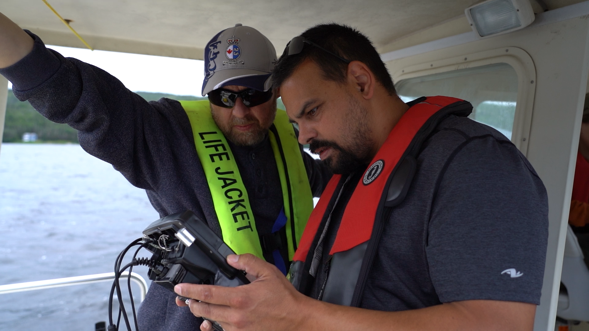 Image of customers analyzing controller screen