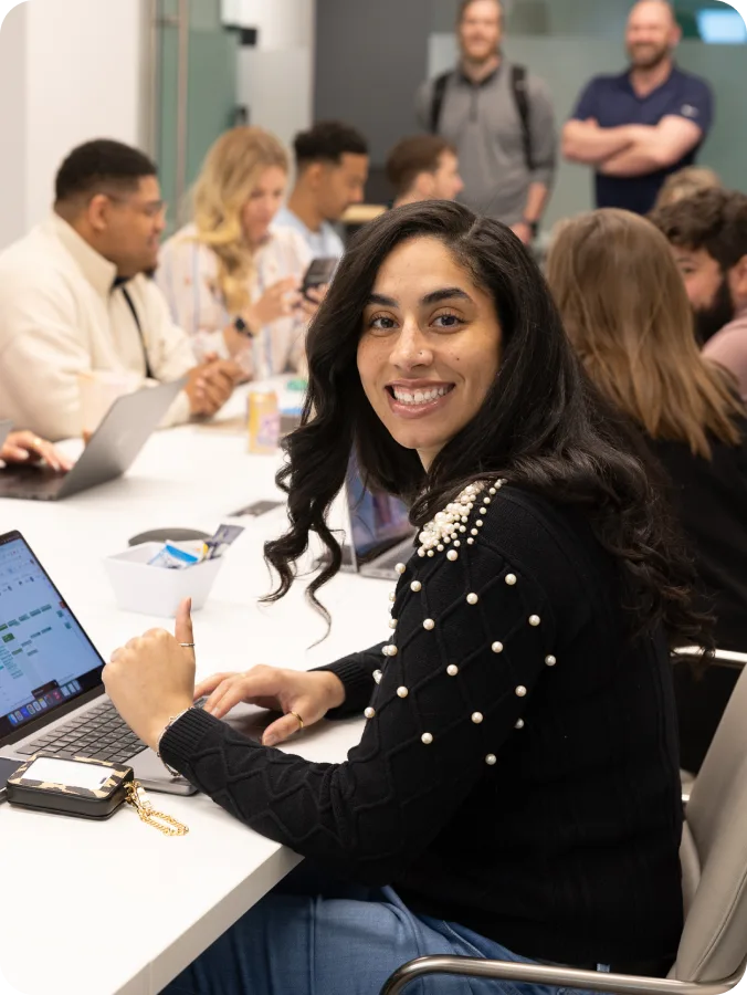 Greenlight employee smiling in conference room