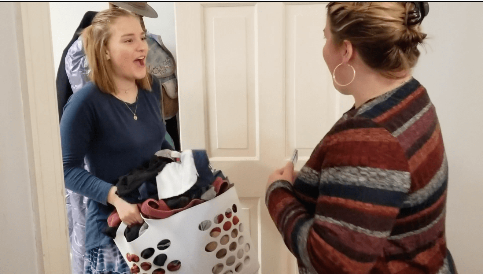 young lady doing laundry