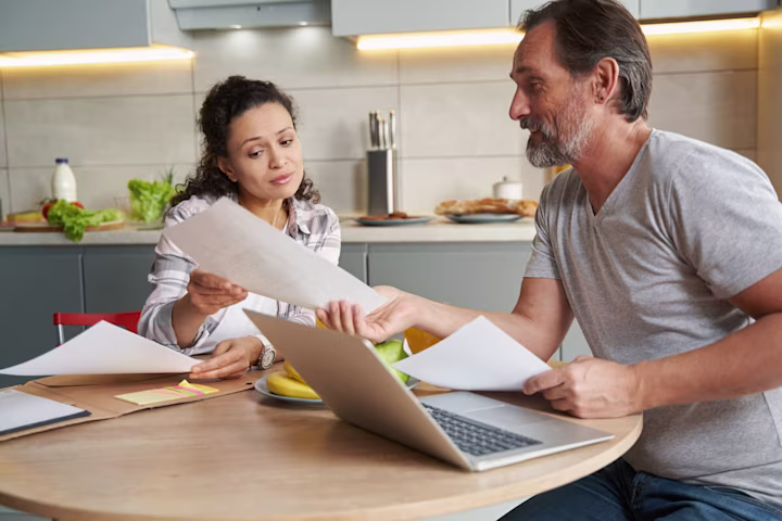 Couple reading a document