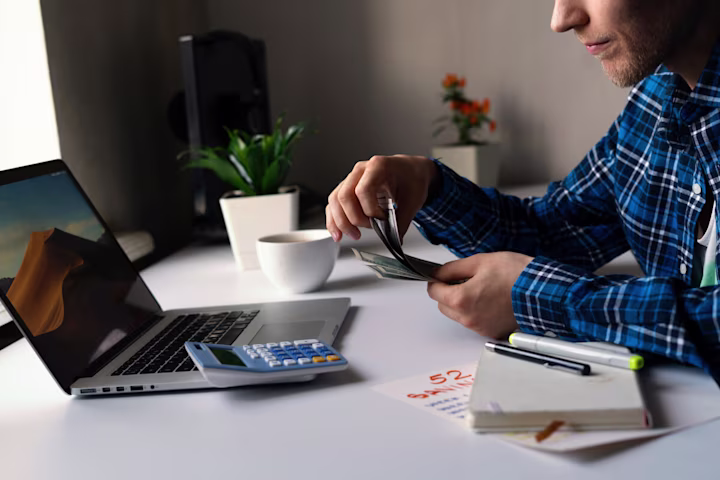 Person counting his money
