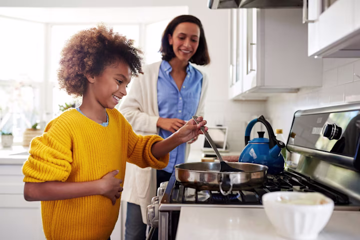 Kid cooking food