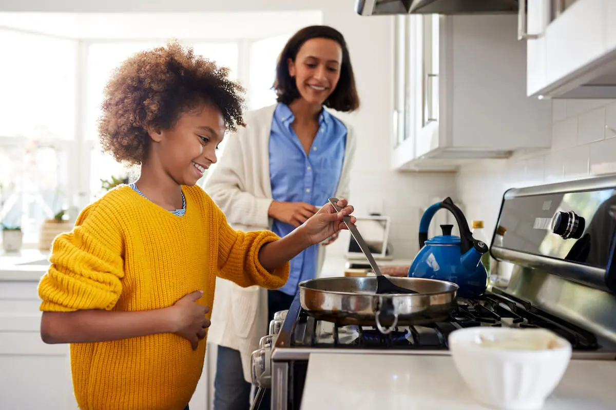 Kid cooking food