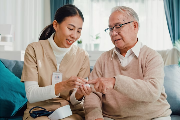 Nurse providing in home care.