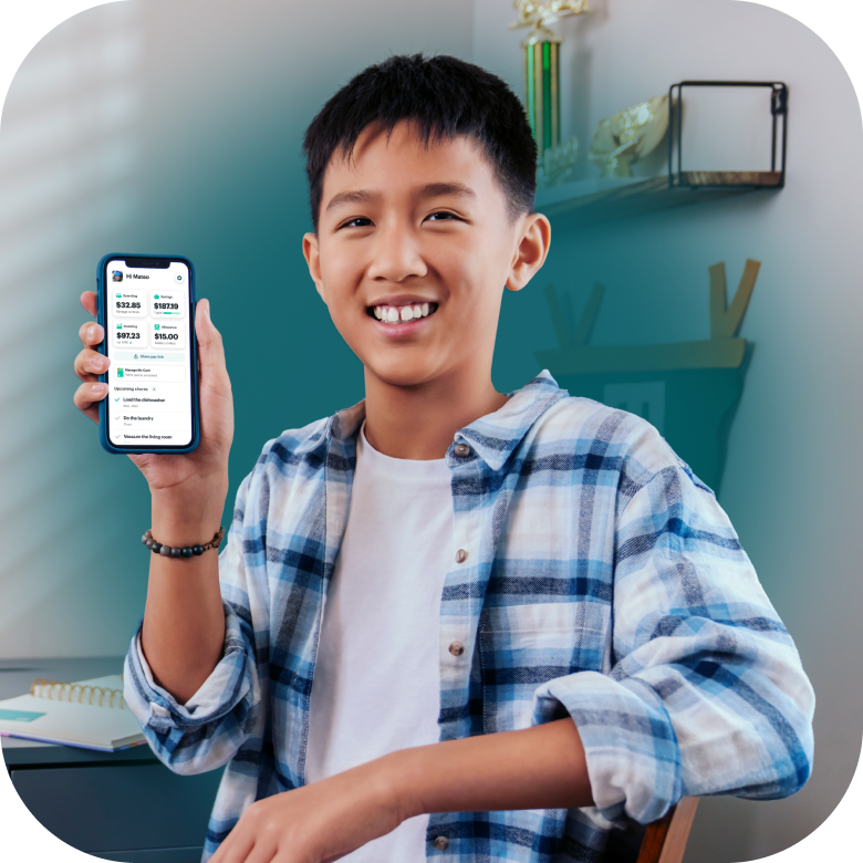 Boy holding phone with greenlight app 