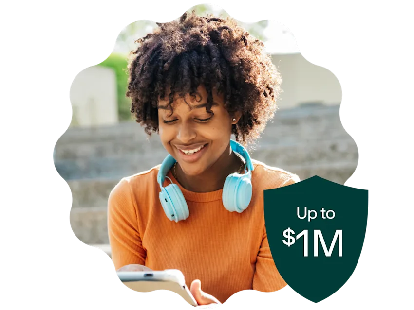 Kid with headphones on with a shield showing up to $1m of protections