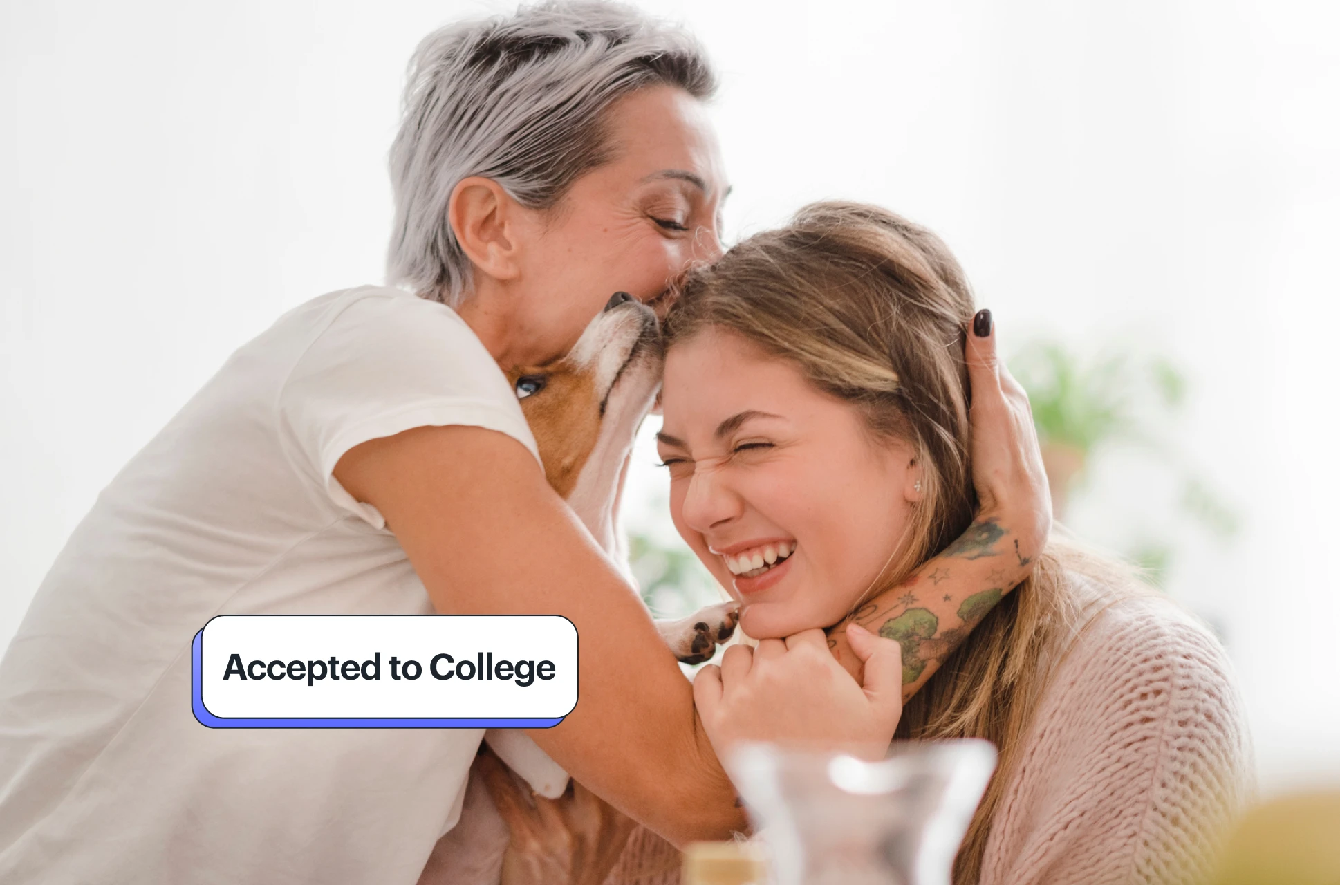 Greenlight teen girl celebrates college acceptance with mom and dog at home