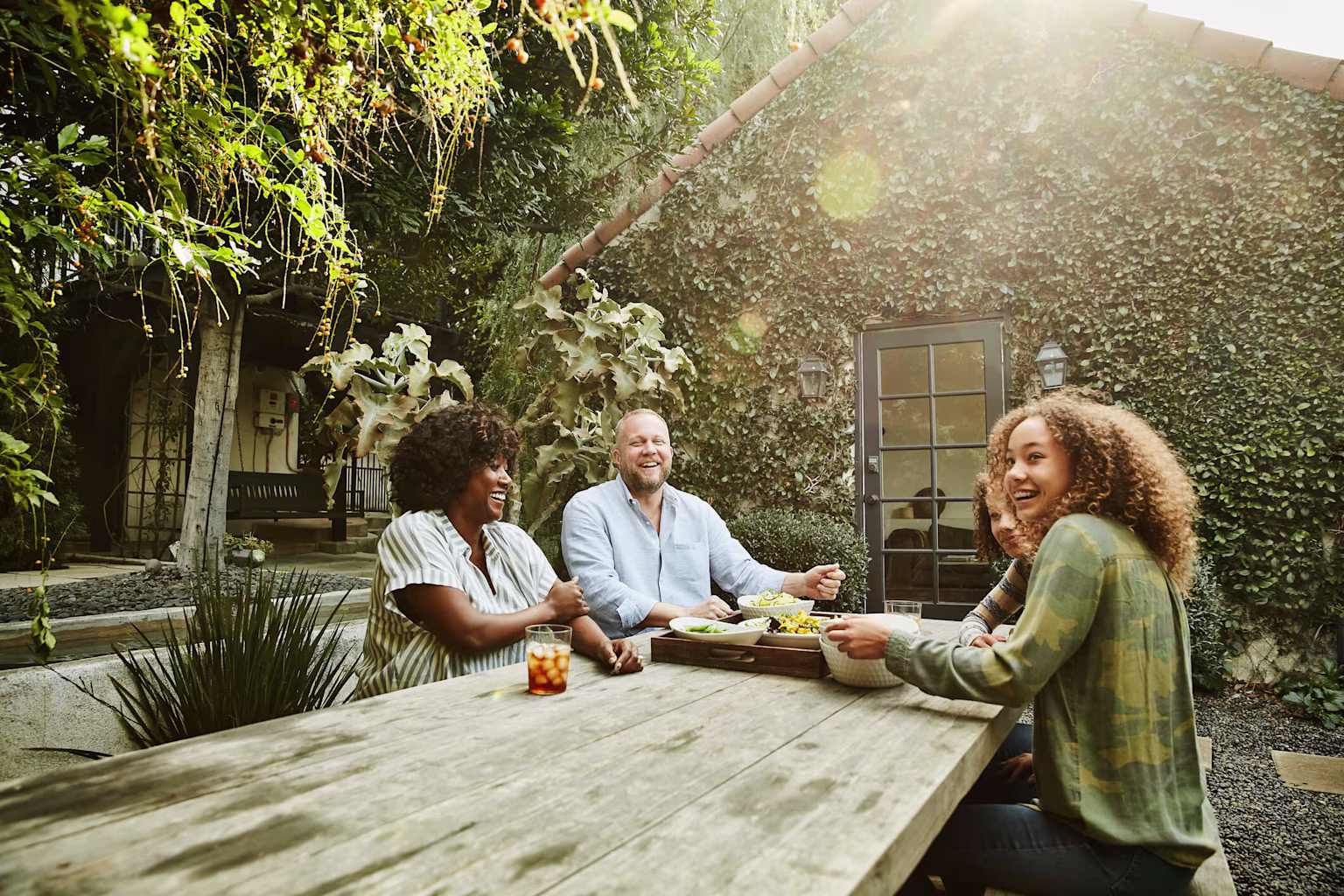 parents at a table with their daughters