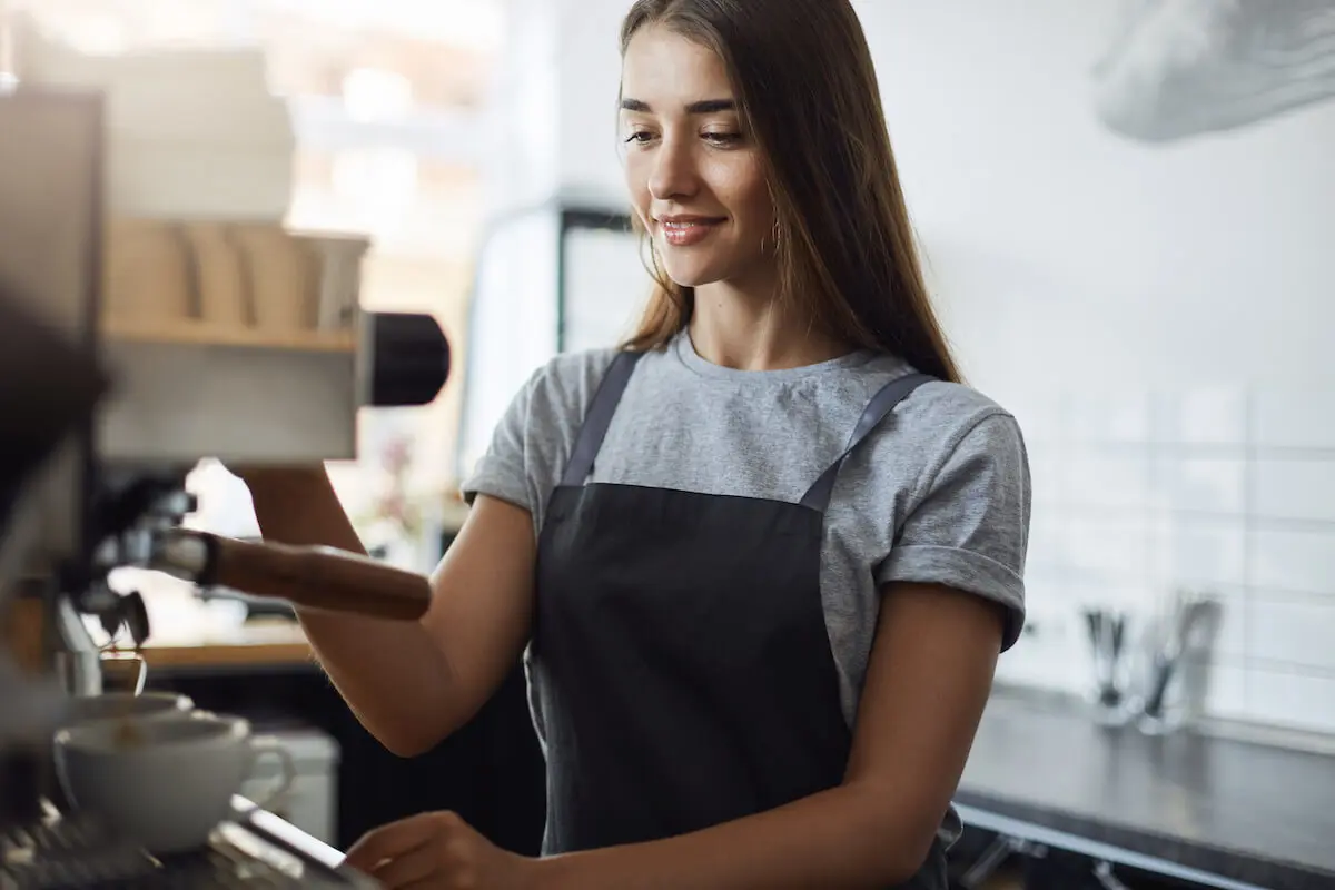 Barista making coffee