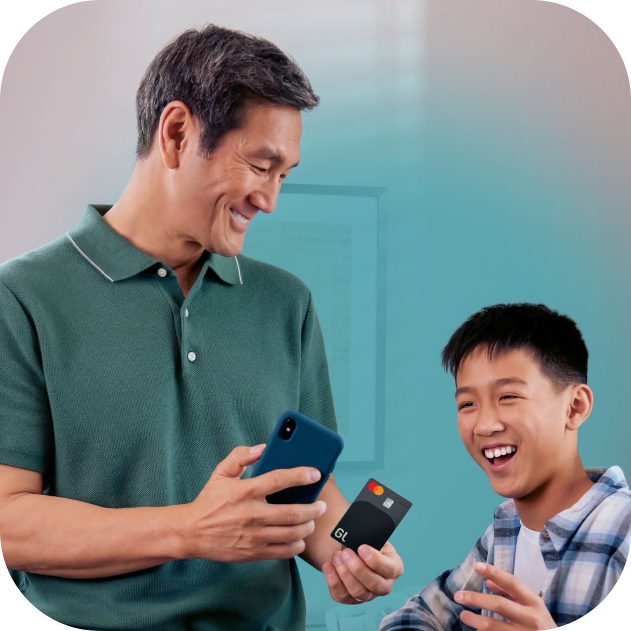 Father and Son Using Greenlight Debit Card and Greenlight App